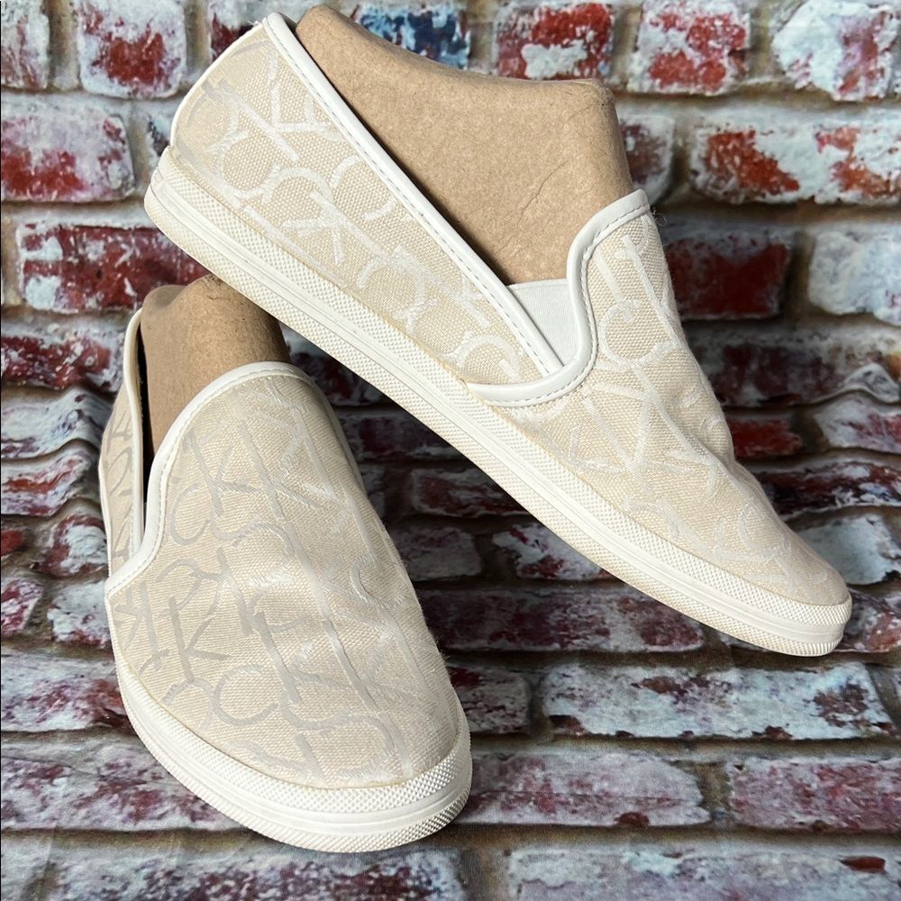 * Calvin Klein Cream Slip-On Sneakers